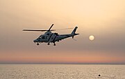 Police helicopter at sunset (Unsplash)