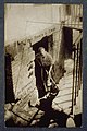 Portrait of Don Dickerman standing in the doorway of his business, ca. 1912-1920. (9563994380).jpg