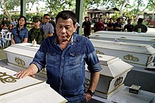 President Duterte pays his last respects to the victims of the bombings. President Rodrigo Duterte pays his last respects to the victims of the bombings in Jolo.jpg