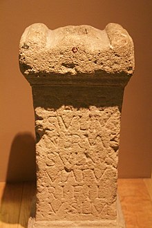 Altar from the Hot Bath, which reads "To the goddess Sulis Minerva Sulinus, son of Maturus, willingly and deservedly fulfilled his vow." Roman baths 2014 53.jpg