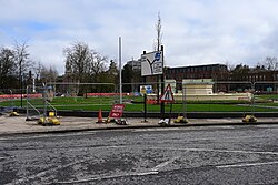 Signage, permanent and temporary, outside the Rose Bowl amid the Queen's Gardens redevelopment in Kingston upon Hull.