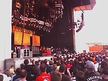 Rush playing at the USANA Amphitheatre in 2007. Rush at USANA Amphitheater.jpg