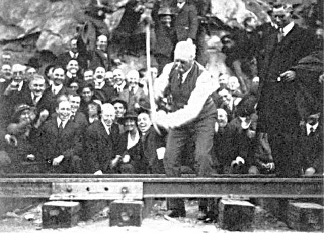 J.D. Spreckels drives the "golden spike" to ceremonially complete the San Diego and Arizona Railway on November 15, 1919