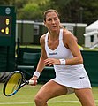 Shahar Pe'er competing in the first round of the 2015 Wimbledon Qualifying Tournament at the Bank of England Sports Grounds in Roehampton, England. The winners of three rounds of competition qualify for the main draw of Wimbledon the following week.