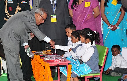 President Pranab Mukherjee launching mid-day meal scheme at a Central Government-run school