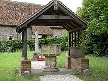 The lychgate, font and war memorial The lychgate at All Saints church, Debach - geograph.org.uk - 4066448.jpg