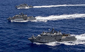 Three CRS-2's Mark VI patrol boats maneuver in formation near Guam - 1.jpg