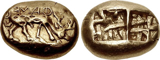 The earliest inscribed coinage: electrum coin of Phanes from Ephesus, 625–600 BC. Obverse: Stag grazing right, ΦΑΝΕΩΣ (retrograde). Reverse: Two incus