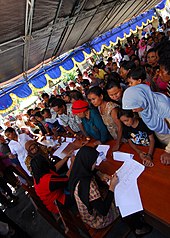 Tobelo patients queue at an engineering civic action program by the U.S. Pacific Fleet humanitarian and civic assistance in Indonesia. US Navy 100713-N-4044H-135 Patients queue at an engineering civic action program.jpg