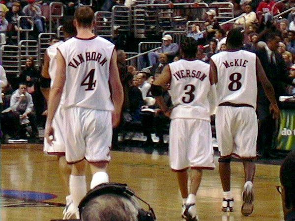 McKie with Sixers' teammates Keith Van Horn and Allen Iverson in 2003