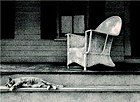 graphite drawing of shaded white porch with rocking chair, window, cat reclining on steps