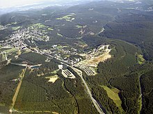 Luftbild von Winterberg mit Berg Kappe (mittig rechts) aus Richtung Westen