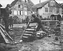 Company D, 83rd Chemical Bn, in Zellenberg. targeting Germans in nearby Mittelwihr with their 4.2 inch mortars, 9 December 1944. Zelle PS CS.jpg