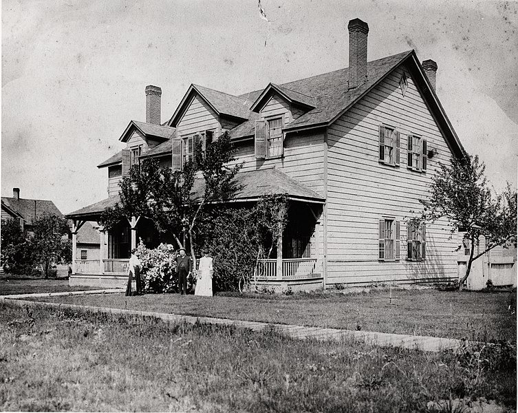 File:"Fort Spokane Officers' Quarters, Agency Period" Two women and a man before duplex. Undated. (39997f4a-4da8-4f32-a36c-3fa4dab47f61).jpg