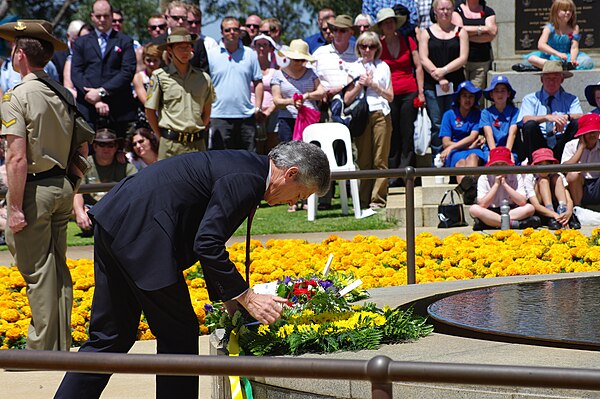 The Australian Minister of Defence, Stephen Smith, lays a wreath at the Eternal flame in Kings Park, Western Australia on Remembrance Day, 2011