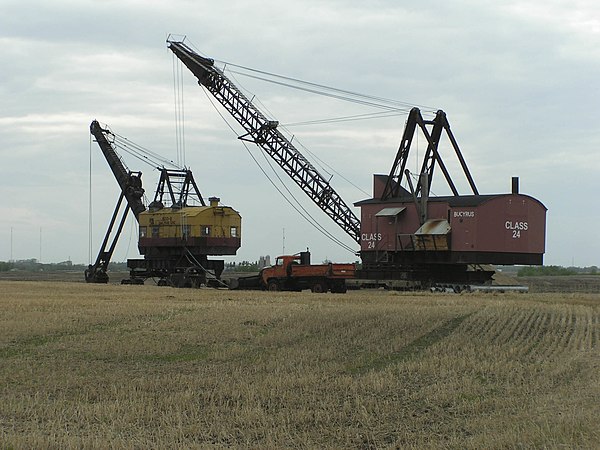 A 200-B power shovel, and a Class 24 on display at the Reynolds-Alberta Museum