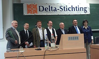 De Benoist (centre) at the Delta Foundation symposium of Antwerp in 2011.