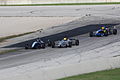 Battle for the lead coming out of Turn 5 at Road America during the 2013 SCCA National Championship runoffs.   This file was uploaded with Commonist.