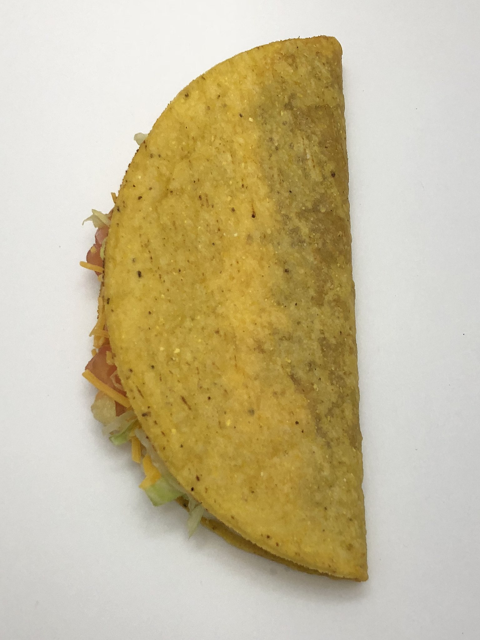 https://upload.wikimedia.org/wikipedia/commons/thumb/a/a2/2020-04-28_21_20_32_A_Crunchy_Taco_Supreme_from_Taco_Bell_in_the_Franklin_Farm_section_of_Oak_Hill%2C_Fairfax_County%2C_Virginia.jpg/1536px-2020-04-28_21_20_32_A_Crunchy_Taco_Supreme_from_Taco_Bell_in_the_Franklin_Farm_section_of_Oak_Hill%2C_Fairfax_County%2C_Virginia.jpg