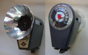 Front and back views of an Agfa Tully flash attachment for AG-1 flashbulbs, 1960