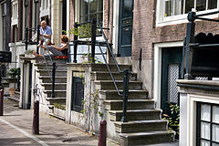 A couple relaxing in their home on a Sunday. Amsterdam, The Netherlands