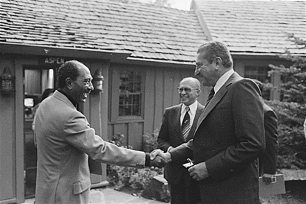Sadat (left) shaking hands with Israeli Defense Minister Ezer Weizman, 1978