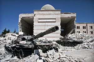 Two destroyed Syrian Army tanks on the outskirts of Ad-Deir.