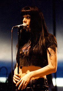 Naked performing live in 2006