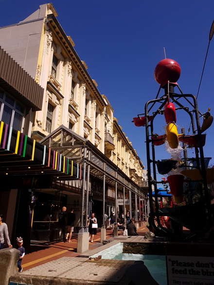 Cuba Street, Te Aro, looking north. The street is considered the microcosm of Wellington's culture, being "quirky", colourful, and packed full of shops, cafés, restaurants and art, such as the Bucket Fountain pictured.