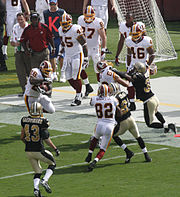 New Orleans Saints receiver David Patten (81) takes a Drew Brees