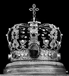 Crown of Norway crown of the King of Norway; made in Stockholm in 1818 by Olof Wihlborg; consists of a ring carrying 8 gold hoops, with a blue enamel globe and an amethyst cross on top; adorned with amethysts, chrysoprases, a topaz, an alexandrite, and a tourmaline