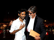 Dhanush with Amitabh Bachchan at the BIG Star Entertainment Awards in 2012 Dhanush Bachchan.jpg