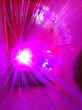 Small disco ball with thin optical fibre cables