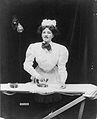 Housemaid ironing, 1908