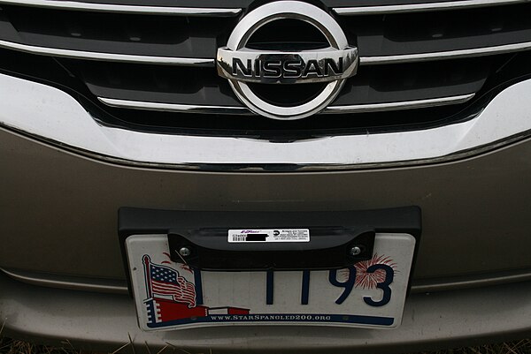 An E-ZPass exterior license plate mount transponder