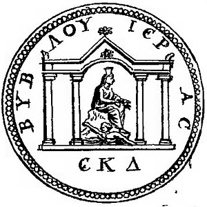 Drawing of a coin showing a seated female figure and four temple pillars. The woman wears a veiled and wears a large headdress. Under her, a man is shown in a swimming position, a representation of a river.