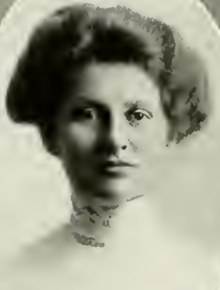 A young white woman with hair in a bouffant style of the 1910s