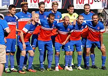 FCC's starting eleven pose for a photo prior to a match again Saint Louis FC on September 5. FC Cincinnati starters group photo (29125666664) (cropped).jpg