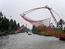 Fishing nets rigged in the waterways of the Cà Mau Peninsula