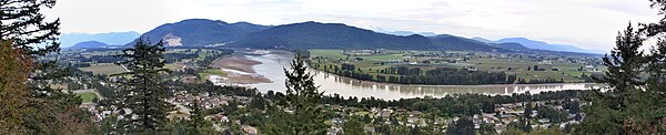 Panoramic view of Fraser River and valley as seen from the grounds of Westminster Abbey, above Hatzic in Mission, British Columbia