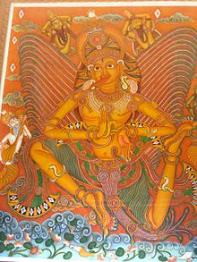 Garuda wearing various serpent-ornaments. Garuda picture sreevallabha temple.JPG