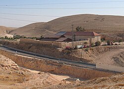 The Inn of the Good Samaritan Museum in 2010, during construction work to expand Highway 1 (Israel-Palestine) to a dual carriageway, separating the inn from the Herodian castle ruins Good-Samaritan-Inn-656.jpg