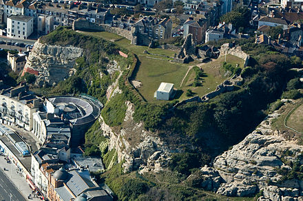 An aerial view of Hastings Castle. Also shown St. Mary in the castle, former church completed 1828. The listed building is now a 500-seat auditorium and exhibition venue.