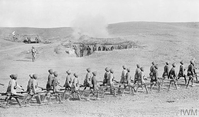 A platoon of the 1/2 Rajputs (51 Brigade, 17th Division) passing a heavy artillery battery in action at Samarra in South of Kut during the First World