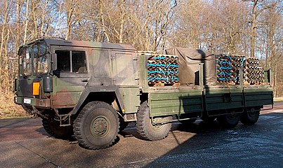 MAN Category I Type 464 LKW 10t mil gl MW Pritsche Kran 10,000 kg 8×8 cargo truck of the German Bundeswehr fitted with a self-recovery winch and body-mounted materials handling crane