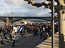 Protest in front of the Theodor Heuss Bridge on 13 March 2021. Mainz Corona Protest 13 Mar 2021.jpg