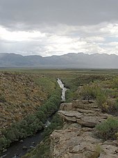 Hot Creek with the Glass Mountains in the distance