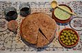 Moretum and Roman bread (14971169175).jpg