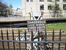 Derelict catenary along the New Haven Railroad main line in Mount Vernon, New York. The segment south of Pelham now uses a third rail. Mount Vernon East-11,000 Volts.JPG