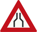 J17: Road narrows on both sides